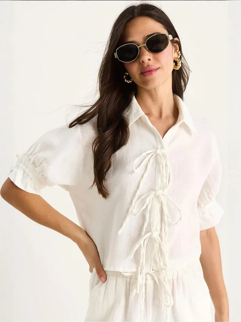 LUCCI Cropped Crepe Top with Bow Tie