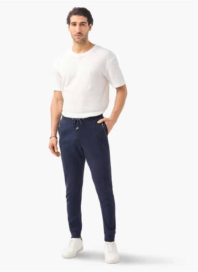 ايكونيك Iconic Panelled Slim Fit Joggers with Drawstring Closure and Pockets