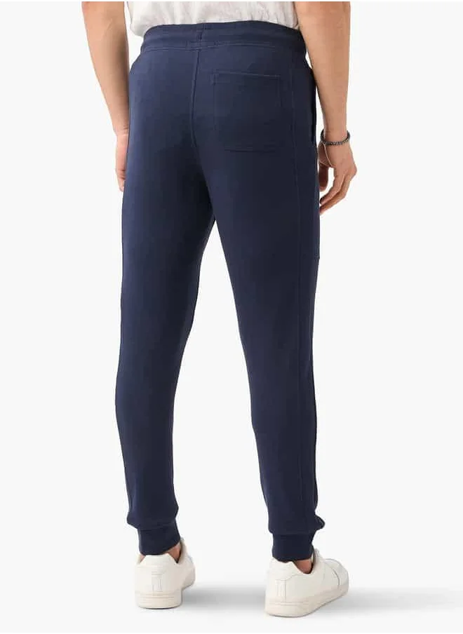 ايكونيك Iconic Panelled Slim Fit Joggers with Drawstring Closure and Pockets