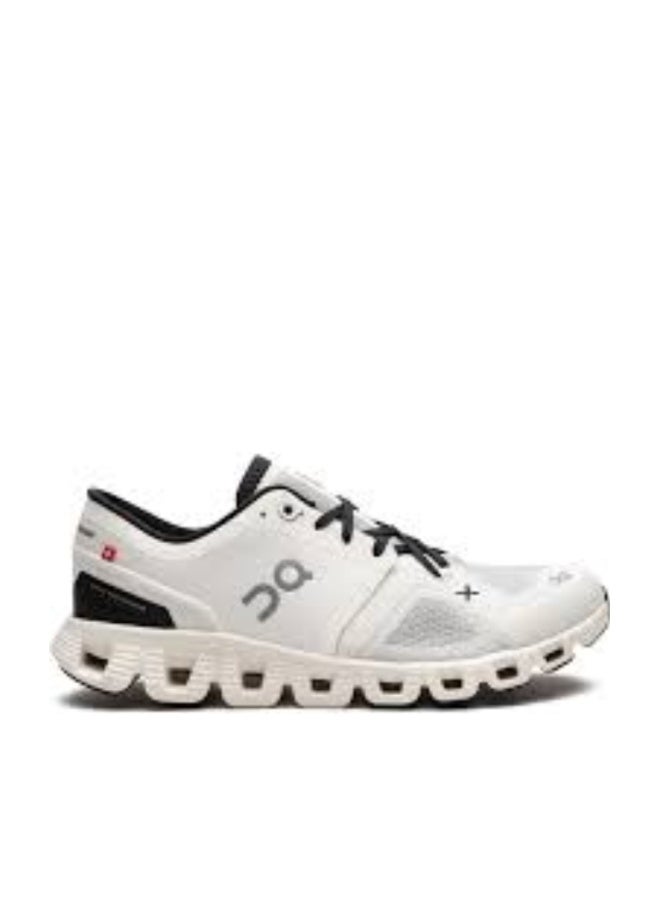 ON training shoe in white and black, designed for versatile workouts and running - Image 1