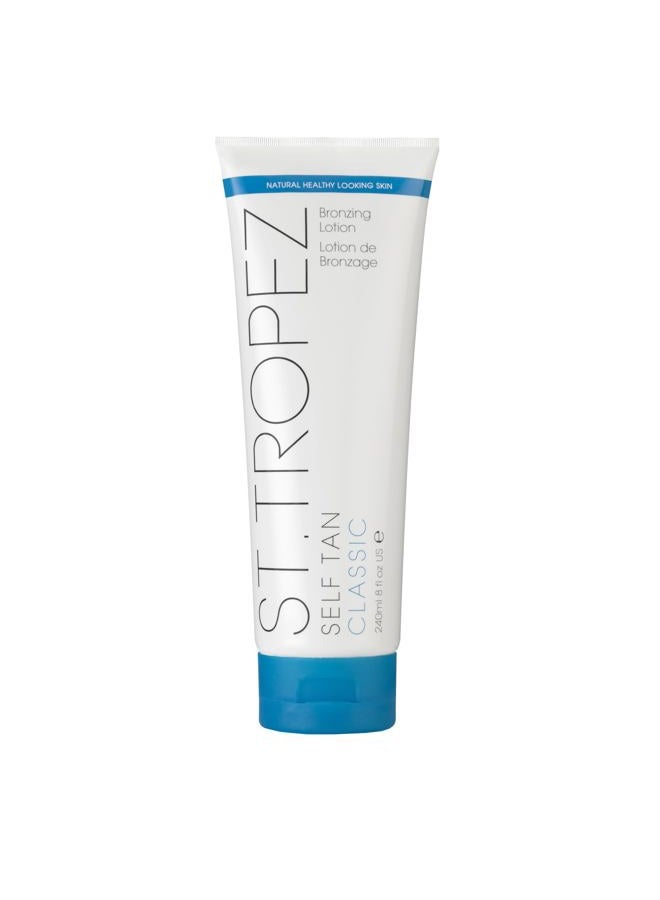 ST.TROPEZ Gradual Tan Classic Daily Firming Lotion, Gradual Sun Kissed Glow Self Tan Moisturizer, 5 Skincare Benefits, Vegan, Natural & Cruelty Free, 8 Fl Oz  - Image 1