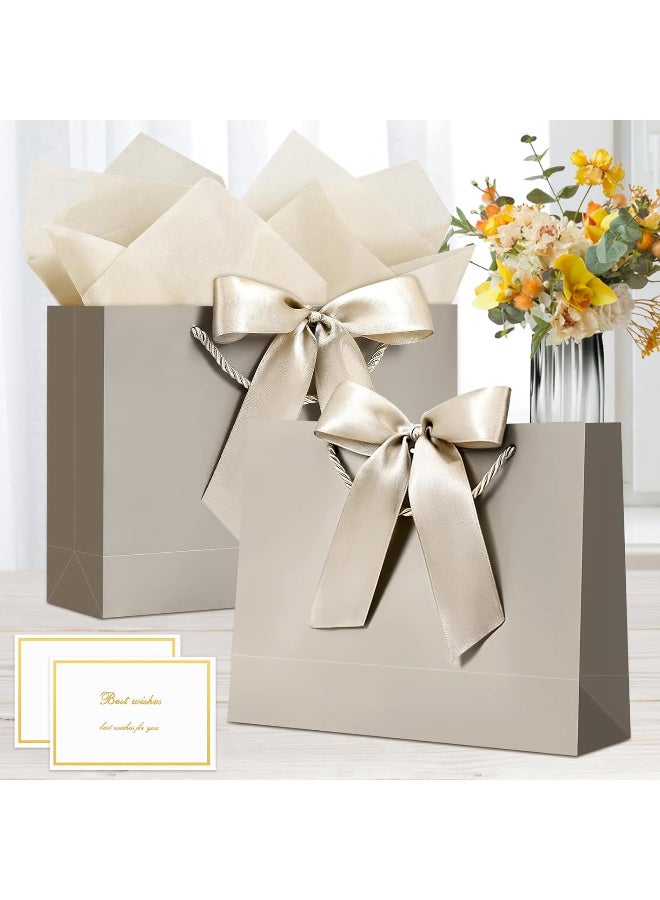 Kawkab Champagne-colored 2-piece gift bag set with handles and ribbon, includes 2 large gift bags, 4 sheets of tissue paper, and 2 greeting cards. Perfect for birthdays, weddings, holidays, parties, and special occasions. Dimensions: 32x11x25cm. - Image 2