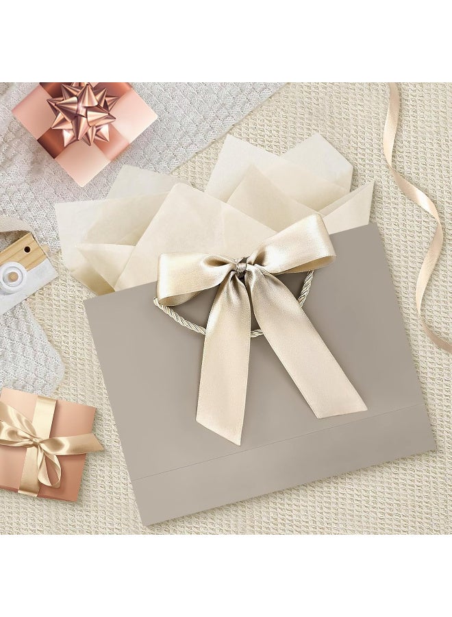 Kawkab Champagne-colored 2-piece gift bag set with handles and ribbon, includes 2 large gift bags, 4 sheets of tissue paper, and 2 greeting cards. Perfect for birthdays, weddings, holidays, parties, and special occasions. Dimensions: 32x11x25cm. - Image 4