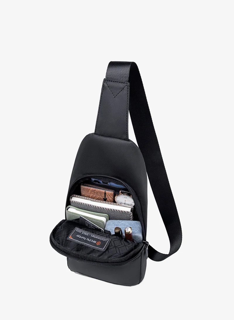 ARCTIC HUNTER  Sling Bag for Men and Women, Water Resistant Durable Small Shoulder Daypack with Built in Earphone Jack and Shock Proof Compartments XB13001 Black  | Best Price UAE