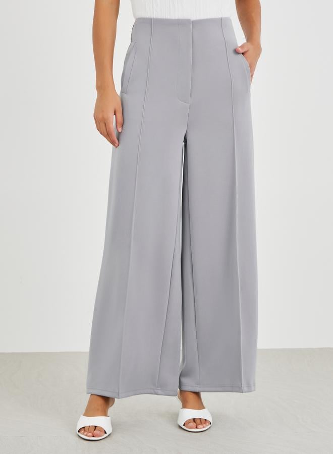 ستايلي بنطلون ستايلي واسع عالي الخصر مع تفاصيل ثنيات - Image 3