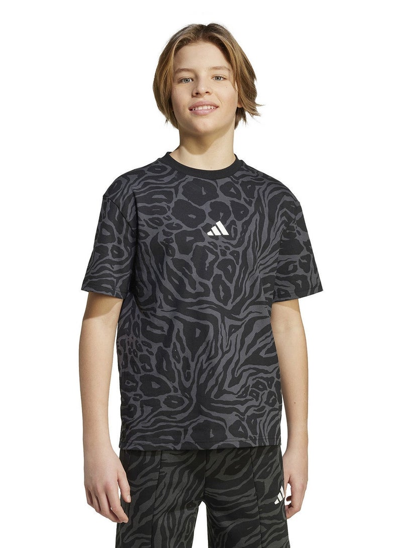 Adidas شعار J FI AOP T أسود/كربون/أبيض - Image 1