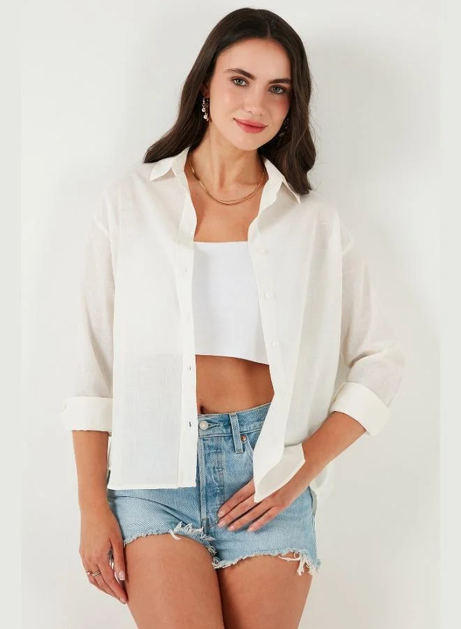 ليلا قميص نسائي بقصة عادية، قصير من الأمام وطويل من الخلف، من مزيج الكتان والقطن