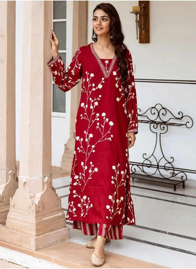 ISHIN Rayon Women Red Rayon Kurta Set with Embroidered pattern Tunic and Palazzo features a Round neckline and Three-Fourth Sleeve secured with Elastic closure and styled in Straight Fit ideal for Festive moments — a must-have for your statement wardrobe.