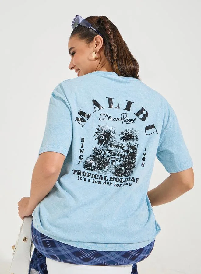 Styli Styli Oversized Malibu Acid Wash Graphics T-Shirt with Dropped Shoulder