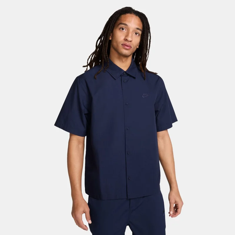 نايكي قميص رجالي بأزرار من دون أكمام للرجال