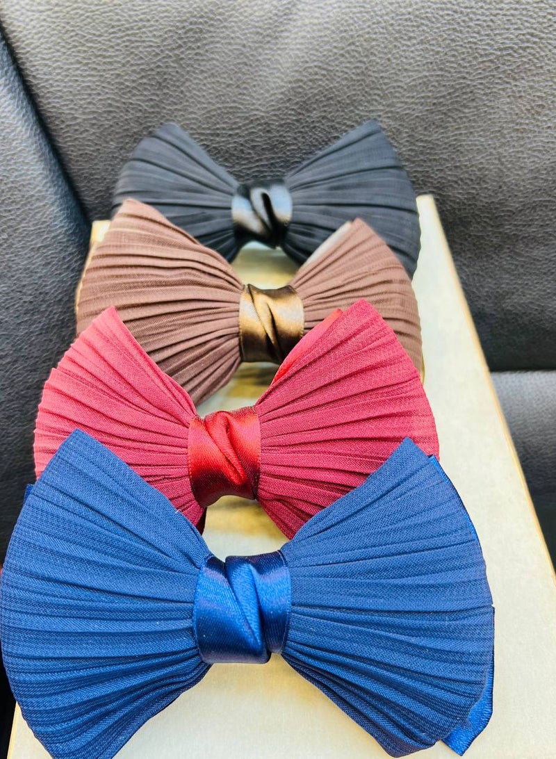 مشبك شعر فيونكة بشريط ستان بلون البني، لمسة ناعمة تضفي على إطلالتك لمسة من الأنوثة والجمال. - Image 2