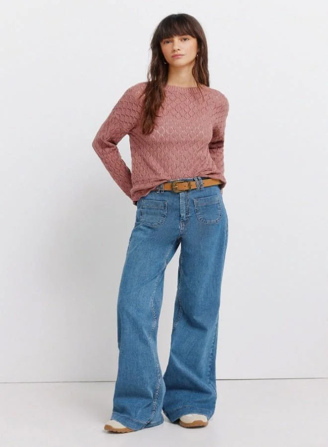 Springfield  Voluminous long sleeve jumper. Round neck. Pointelle knit with openwork details. Ribbed neck. Wavy hem and cuffs. This garment is made with sustainable cotton. for Women | Best Price UAE