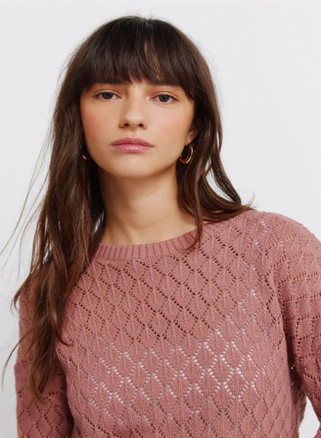 Springfield  Voluminous long sleeve jumper. Round neck. Pointelle knit with openwork details. Ribbed neck. Wavy hem and cuffs. This garment is made with sustainable cotton. for Women | Best Price UAE