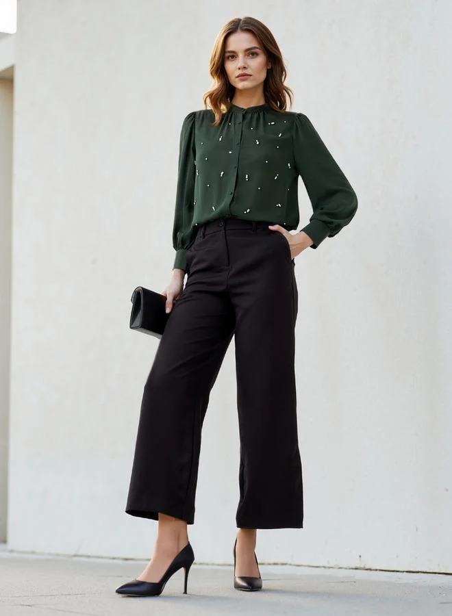 ايكونيك بلوزة مزينة بأكمام منفوشة