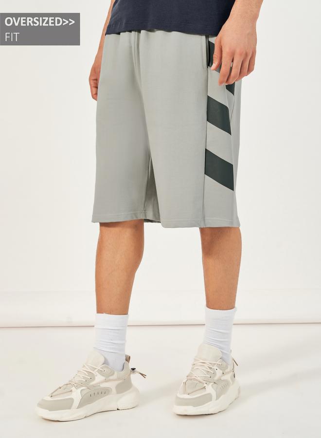 ستايلي شورت تيري فضفاض مزين بخطوط جانبية - Image 1