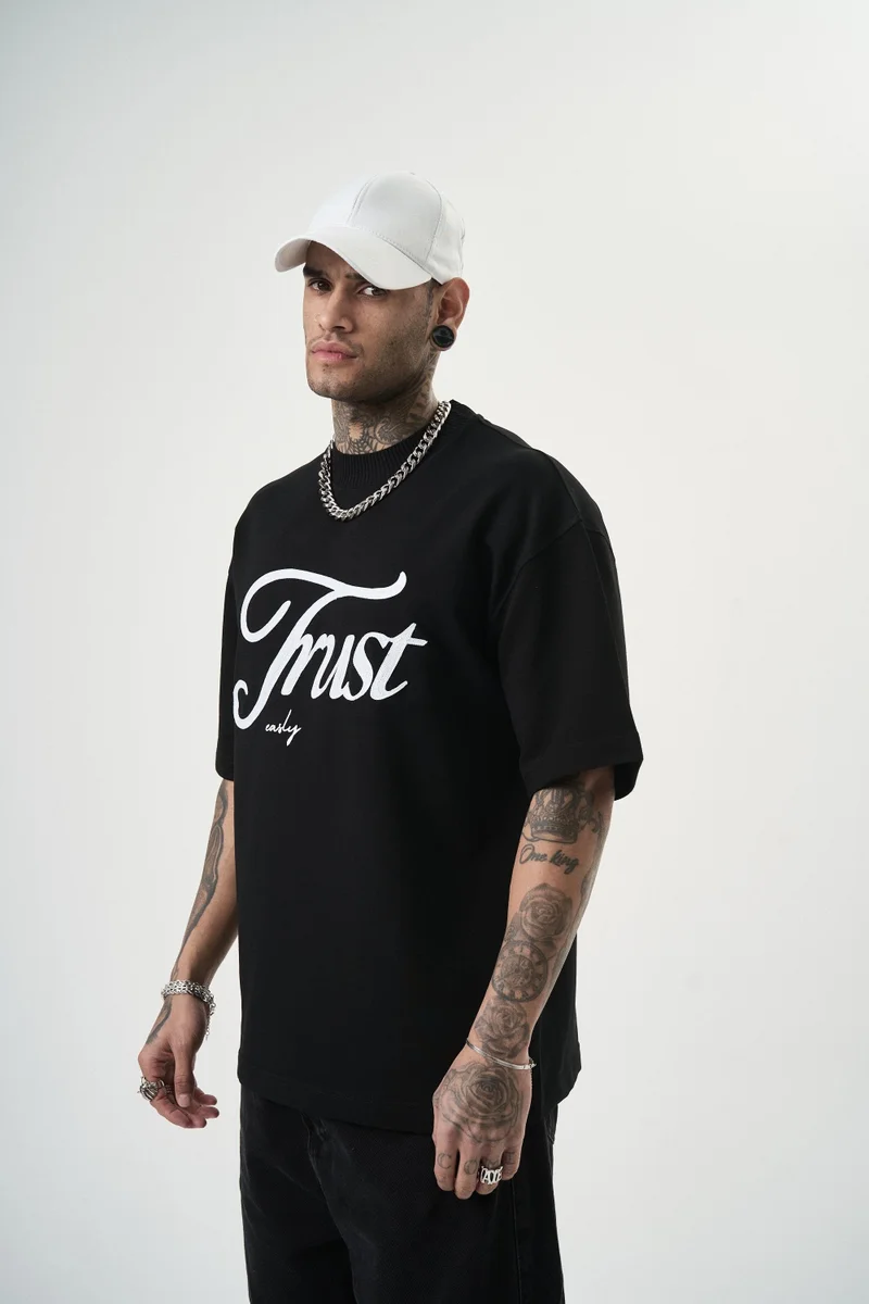 ريسباير تي شيرت رجالي مقاس كبير (Oversize) مطبوع عليه "Trust"، أسود