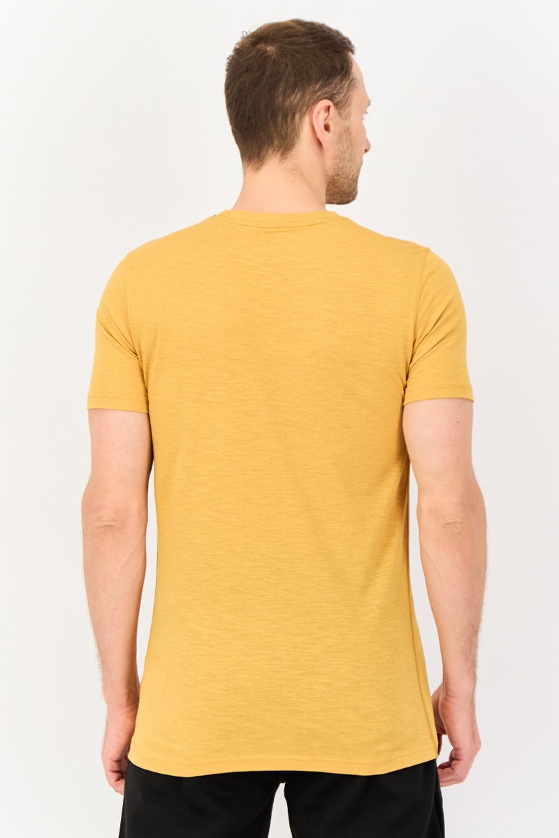 PUMA Men Sportswear Fit Short Sleeve Graphic Print Outdoor T-Shirt, Mustard - Image 3