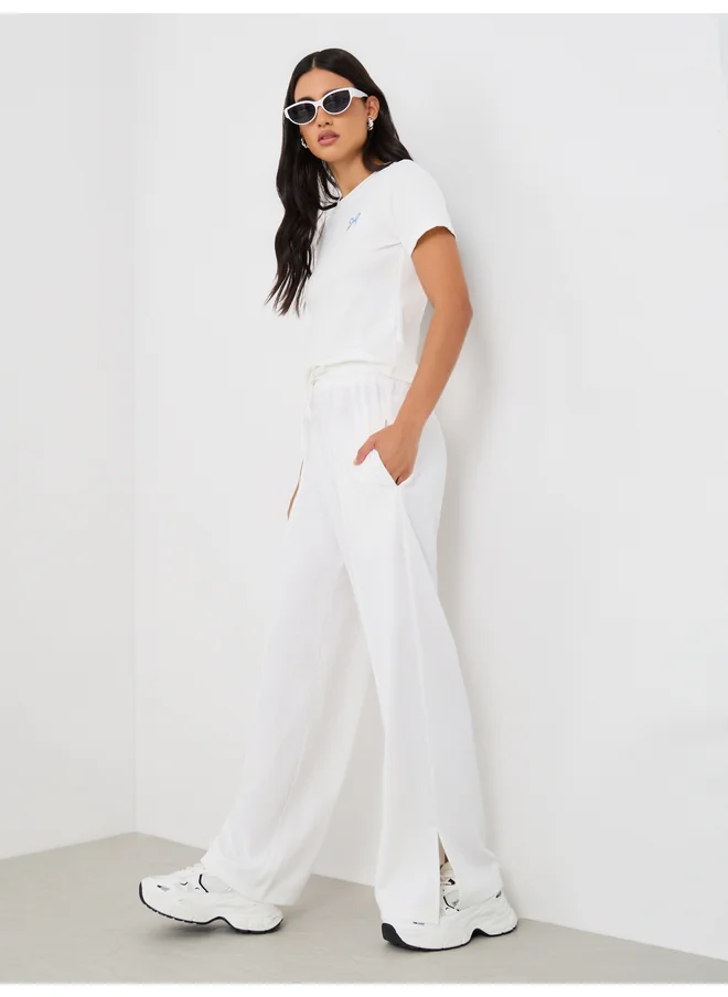 Styli Styli Pin Tuck Wide Leg Joggers with Side Seam Slit