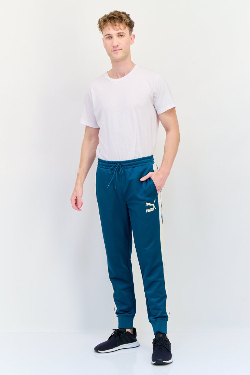 PUMA Men Slim Fit Brand Logo Outdoor Sweatpants, Green  - Image 4