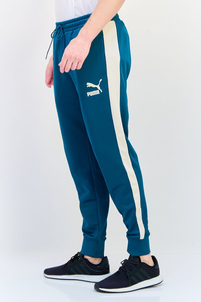 PUMA Men Slim Fit Brand Logo Outdoor Sweatpants, Green  - Image 2