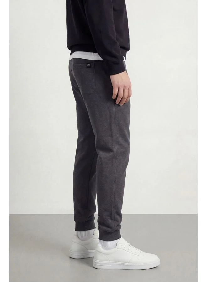 Mmetalic  Men’s Anthracite Sweatpants with Back Pocket Label, Detailed Hem, Elastic Waist, Regular Fit for Men | Best Price UAE