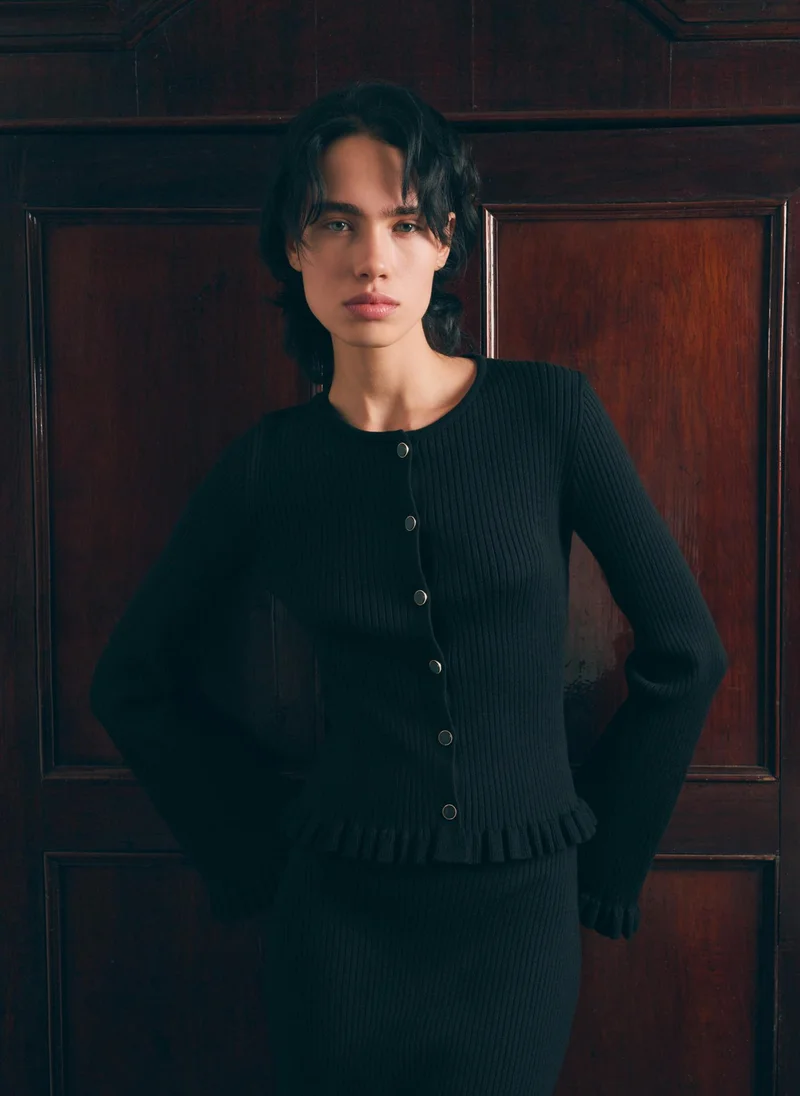 Ribbed knit cardigan with ruffles