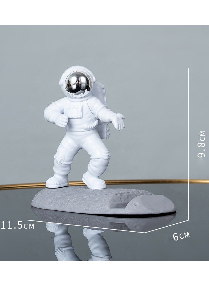 Unique and cute phone stand with astronaut, desktop smartphone stand - Image 1