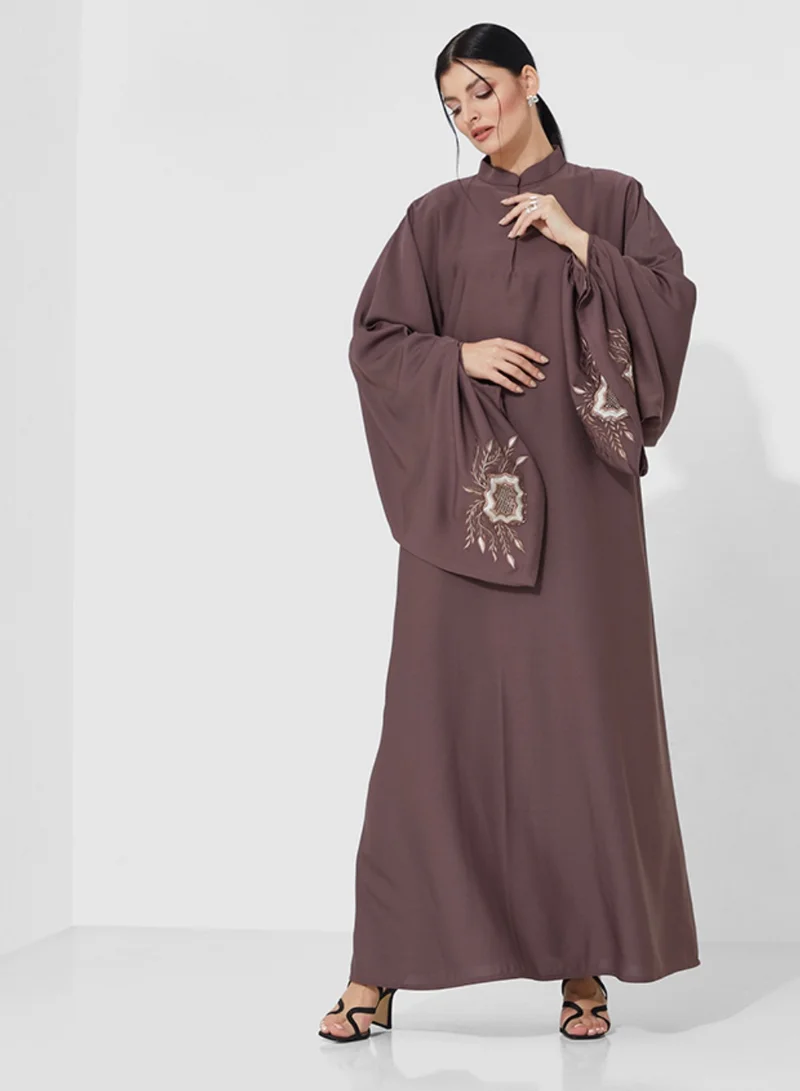 Rosette Abaya Abaya embroidery on flowing sleeves, adding elegance and charm