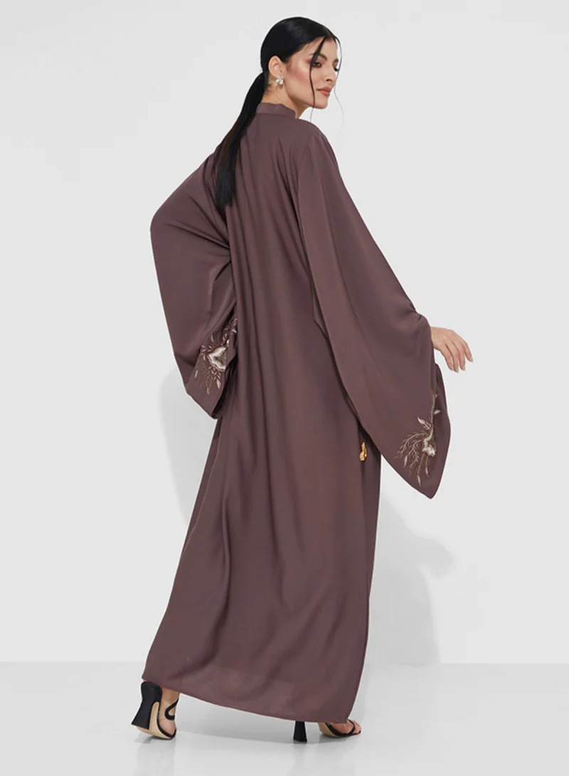 Rosette Abaya Abaya embroidery on flowing sleeves, adding elegance and charm
