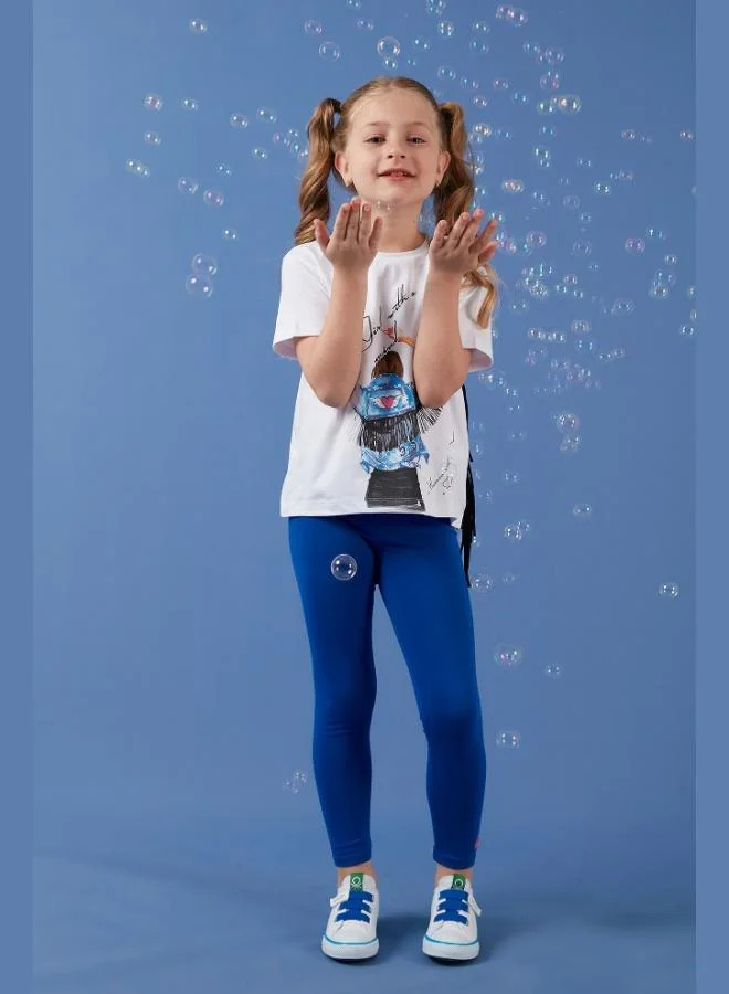 ليلا تيشيرت قطن بطبعة وتفاصيل شراشيب ورقبة دائرية للبنات