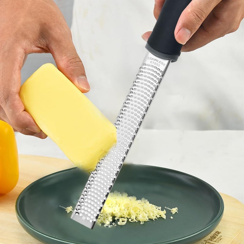Restynic Lemon Zester Grater with Handle, Multi-use Kitchen Tool for Zesting Fruits, Grating Vegetables, Cheese, and Spices, with Protective Cover & Cleaning Brush - Image 1