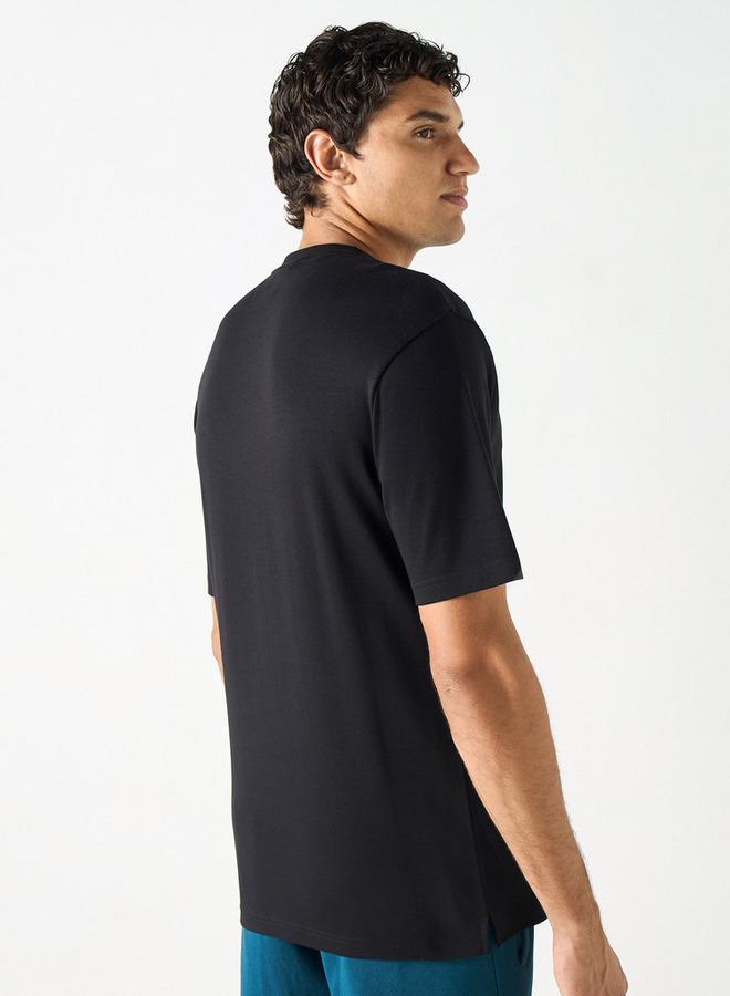 كابا تيشيرت بطبعات جرافيك بياقة ضيّقة وأكمام قصيرة من كابا - Image 3