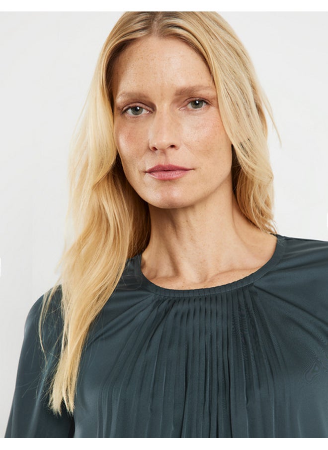 Flowing pleated blouse