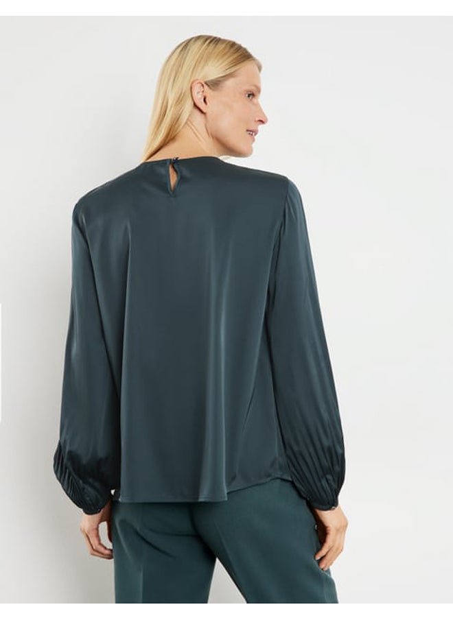 Flowing pleated blouse