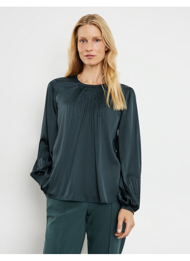 Flowing pleated blouse