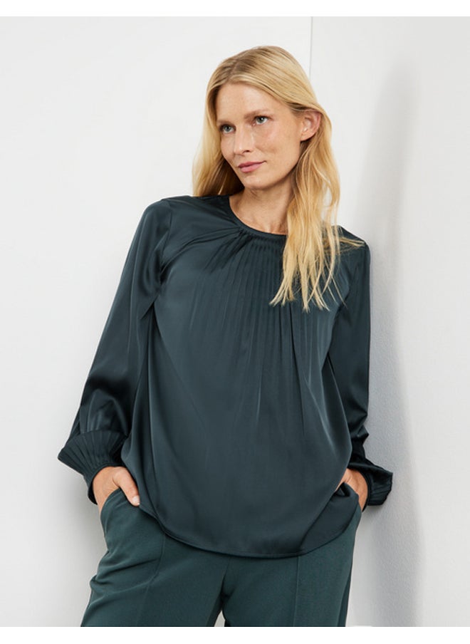 Flowing pleated blouse