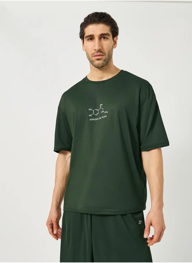 ستايلي Oversized Slogan Print Round Neck T-Shirt and Shorts Set