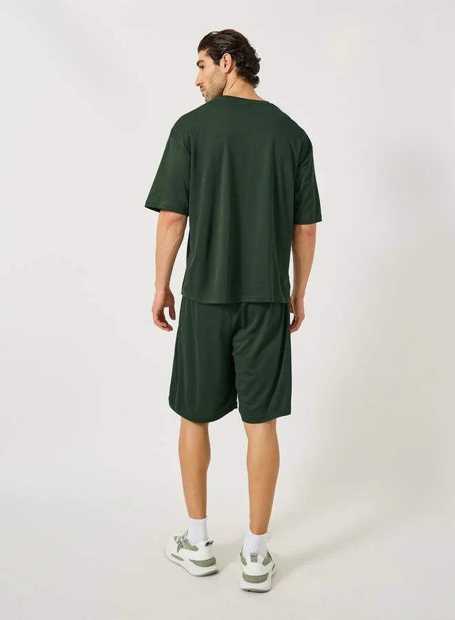 Styli Oversized Slogan Print Round Neck T-Shirt and Shorts Set