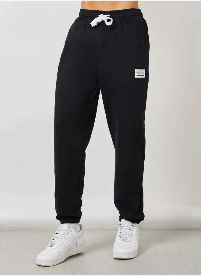 ستايلي Patch Detail Joggers with Drawstring Closure