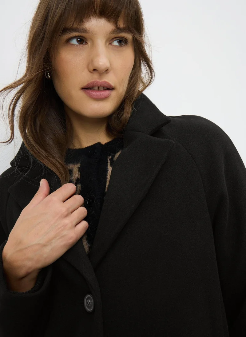 ماتلان معطف ذكي أسود