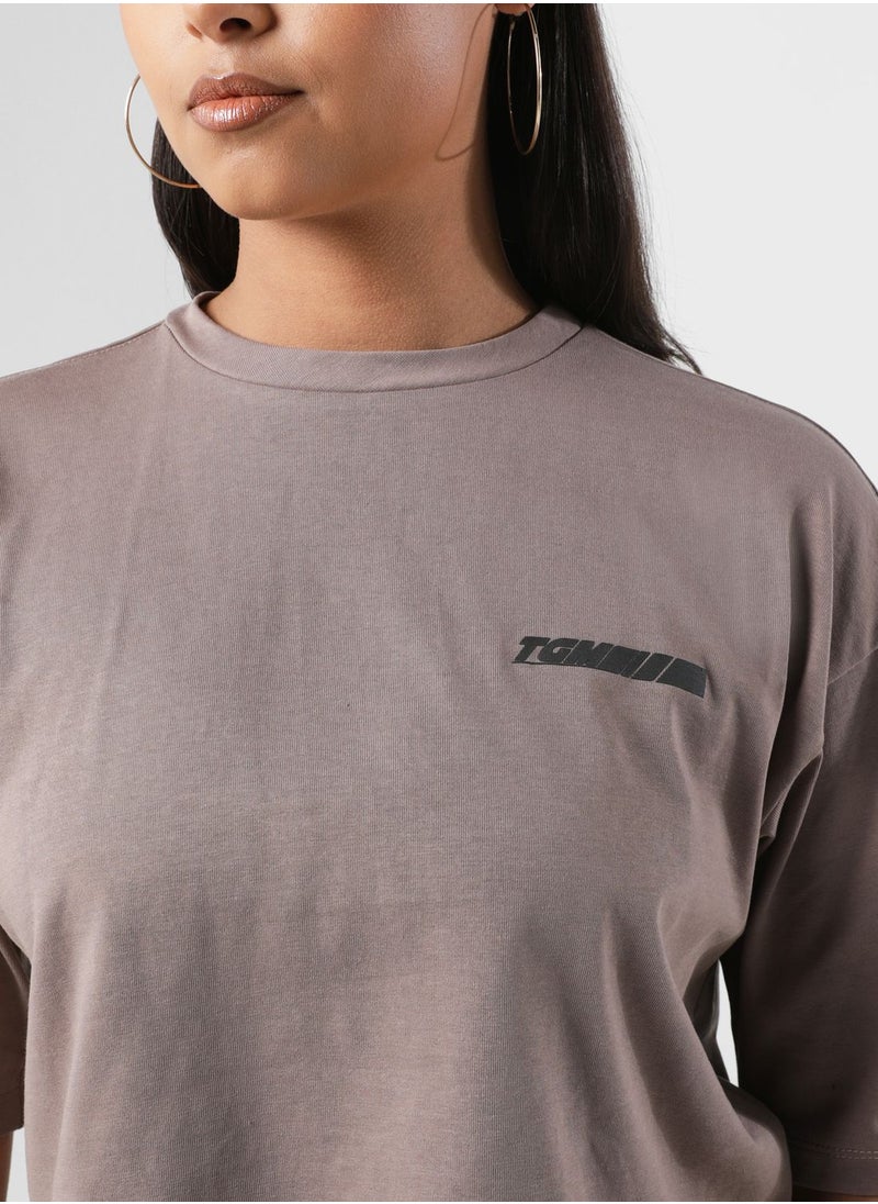 The Giving Movement - Boxy Racer Printed Cropped T-Shirt - Image 1