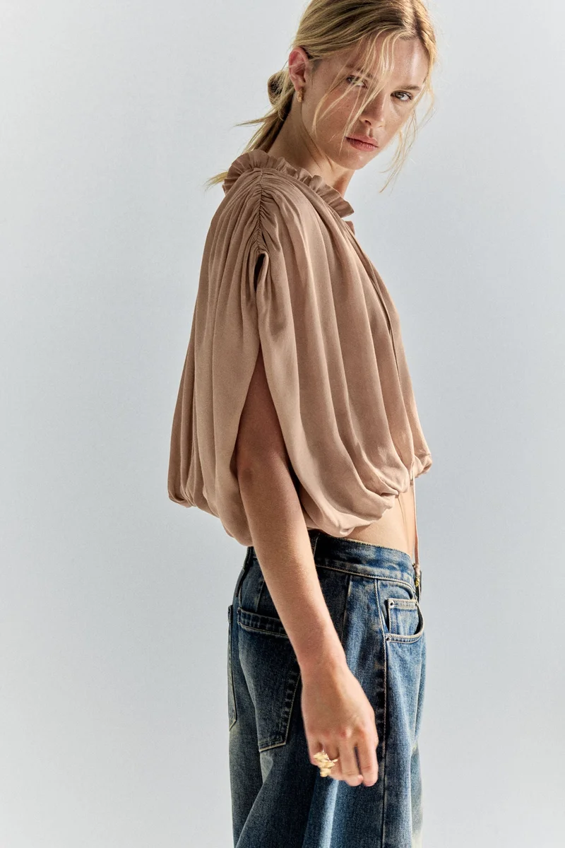 H&M Oversized bubble-hem blouse