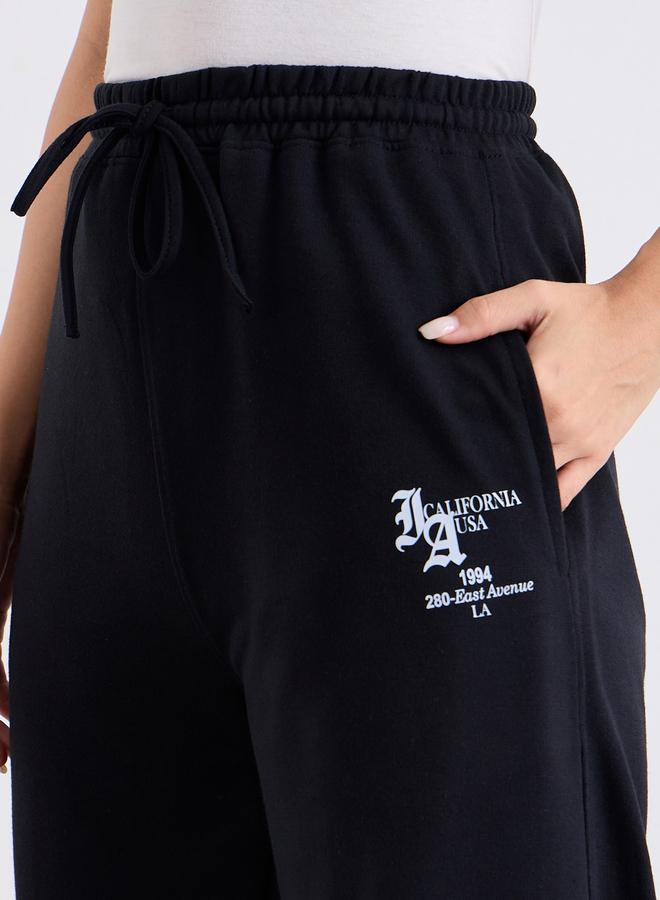 ستايلي جوغر بأرجل واسعة وطبعة كتابة - Image 3