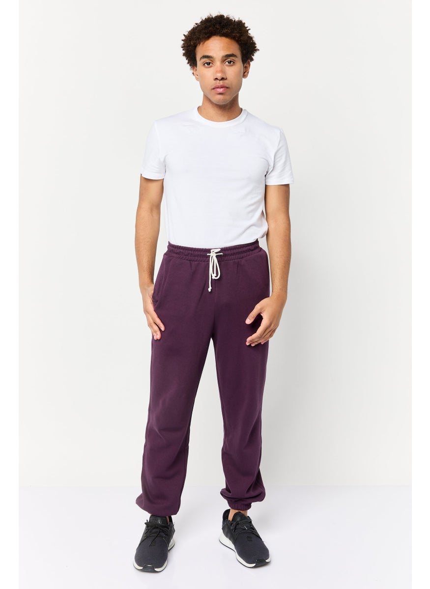 PUMA Men Relaxed Fit Outdoor Sweatpants, Purple  - Image 2
