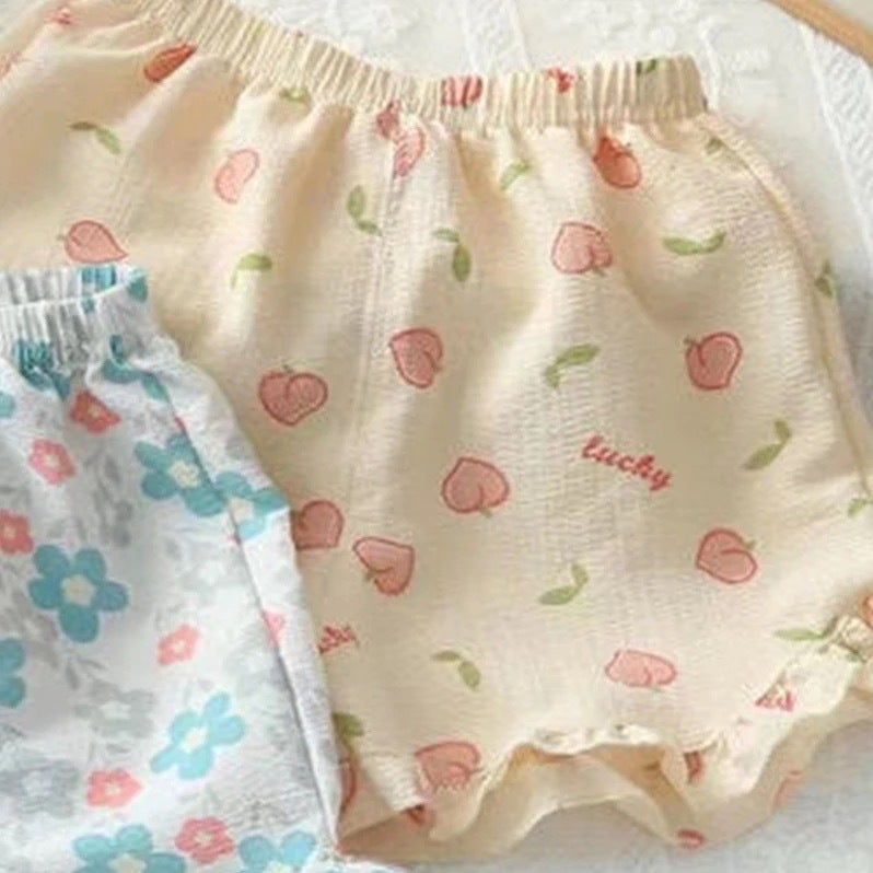 شورت صيفي أنيق ومتعدد الاستخدامات للفتيات الصغيرات - ملابس خارجية بحافة دانتيل رفيعة - شورت بناتي برسوم كرتونية