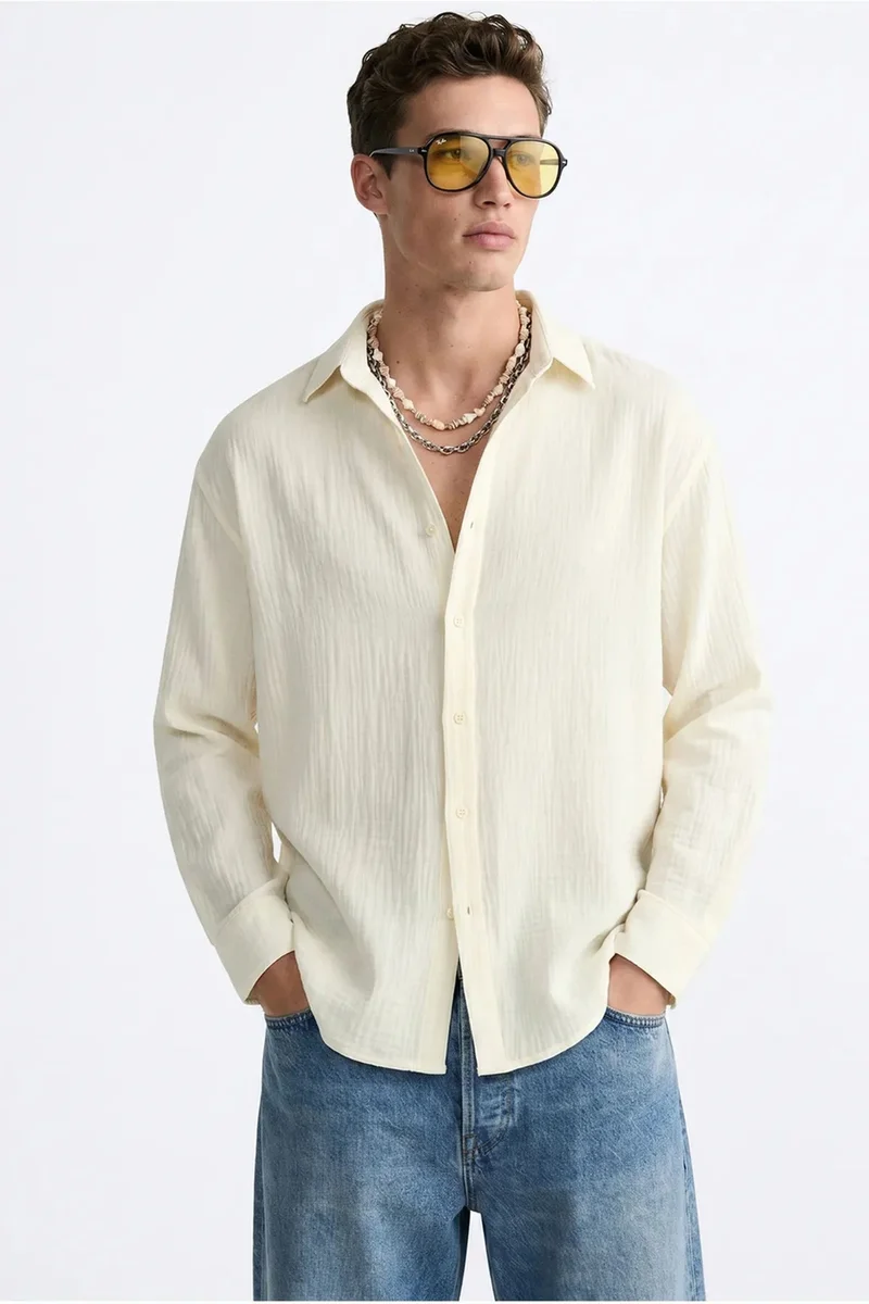 بيانكو لوتشي LUCCI Oversized Textured Button-Front Shirt
