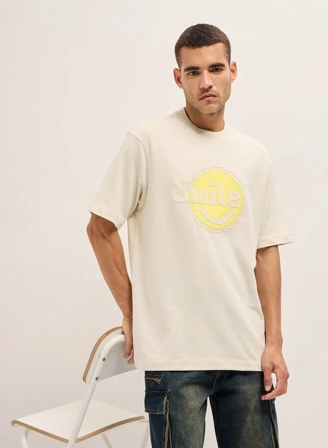 Men's Cream Pixelated Smiley Face Oversize Crew Neck T-shirt Perfect For Casual Wear, Gym, Travel, Or Layering Stylish And Versatile Essential For Every Wardrobe