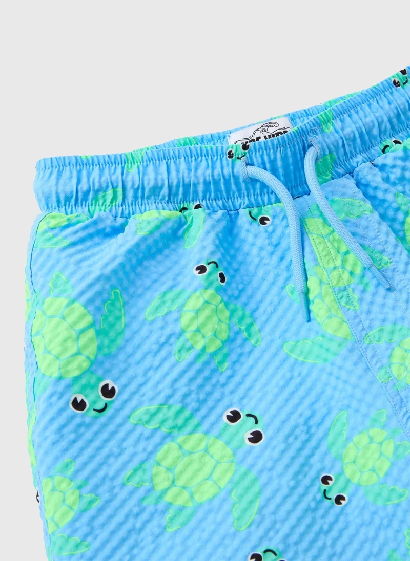 ماتلان Boys Blue Turtle Textured Swim Shorts