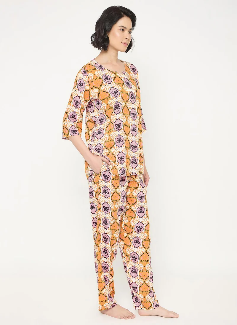 كلوفيا Clovia Printed Top & Pyjama Set in Multicolour - Rayon