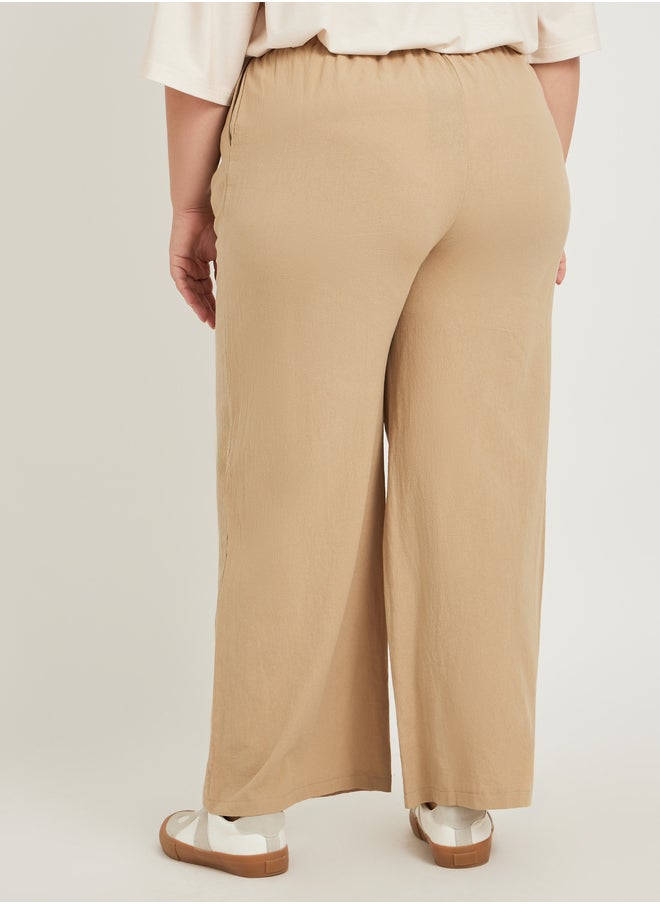 Styli Plus Size Solid Wide Leg Pants with Drawstring Waist  - Image 4